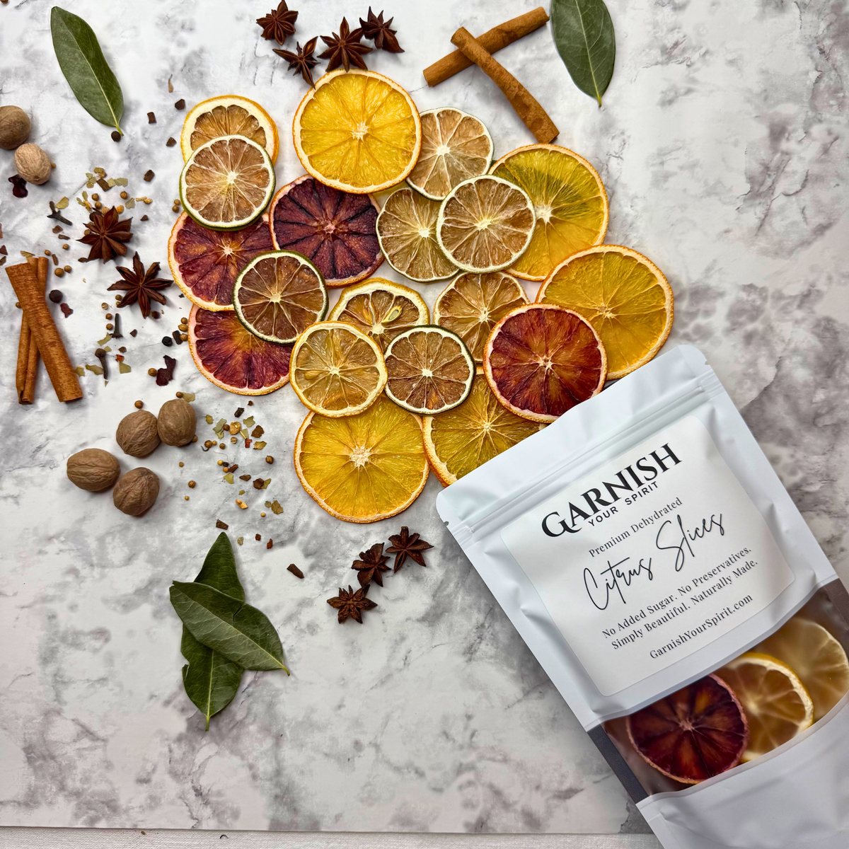 Dried citrus slices, spices, and a garnish pouch